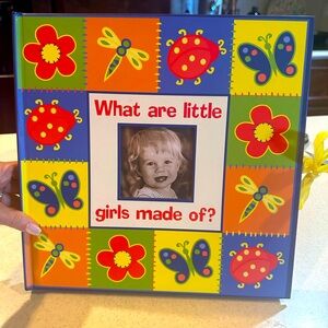 Colorful Girls Photo Album by Publications Int. 
What little girls are made of..
